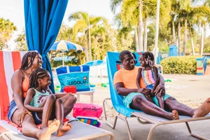Family enjoying a water park cabana