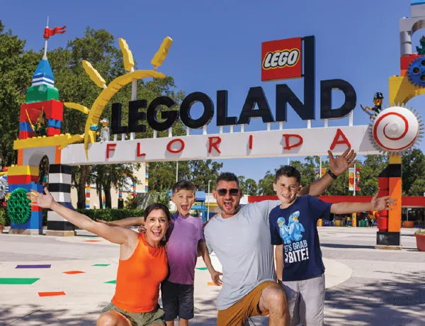 Family cheering in excitement outside of LEGOLAND Florida