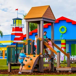 Kid's outdoor play area in every cove of Beach Retreat Resort